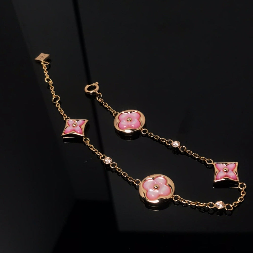 Miro STAR AND SUN 4 MOTIF PINK MOP PINK GOLD BRACELET