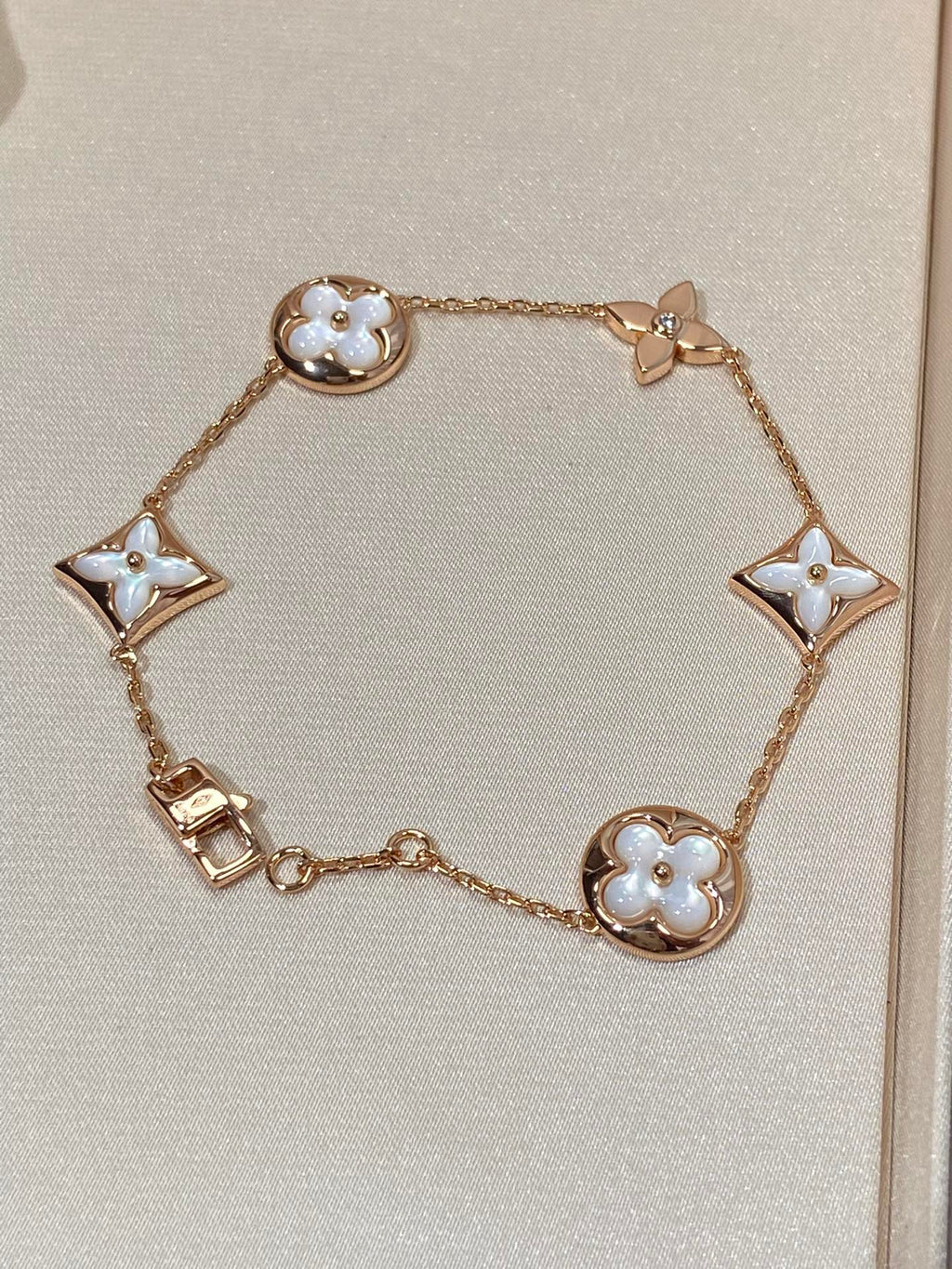Miro STAR AND SUN 5 MOTIF MOP PINK GOLD BRACELET
