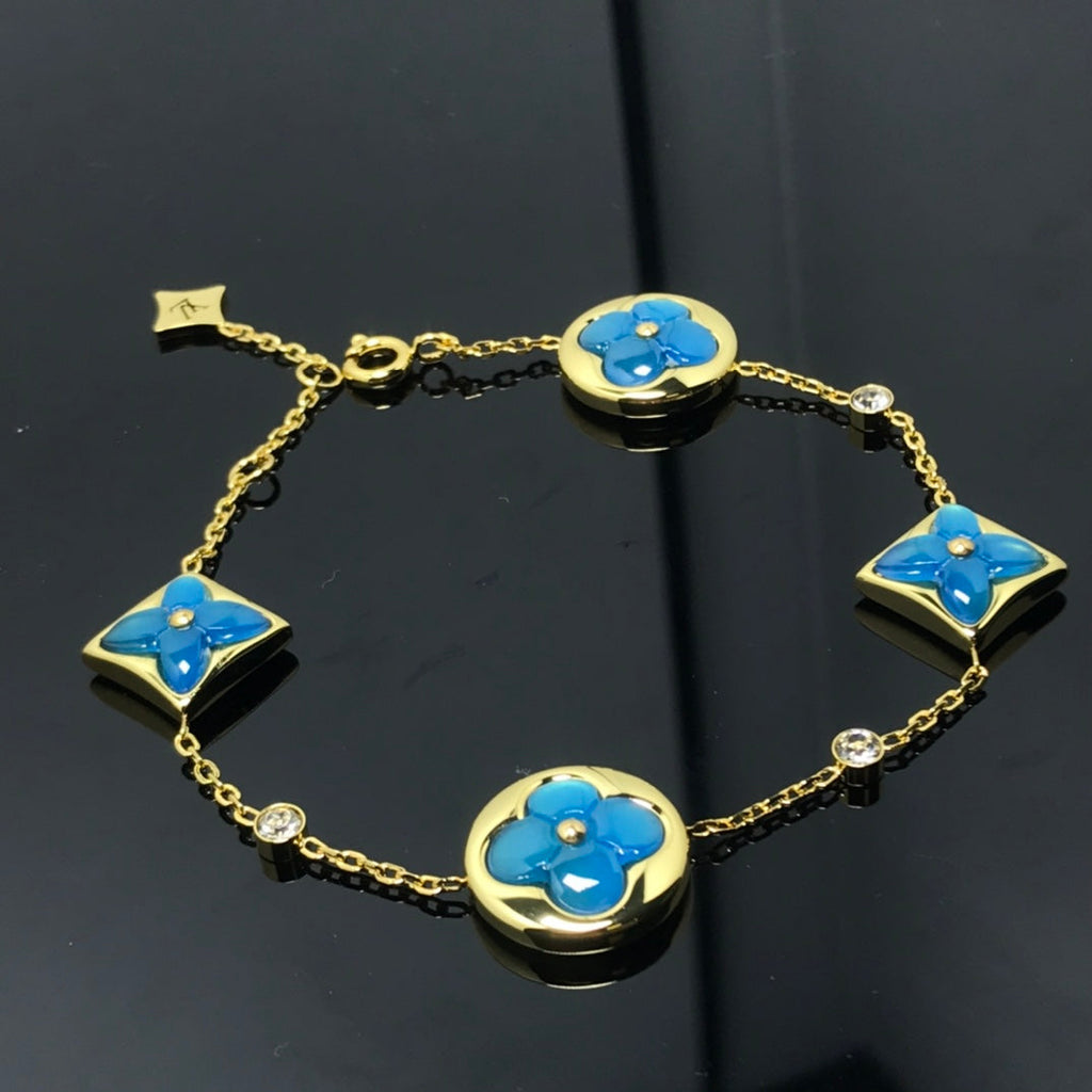 Miro STAR AND SUN 4 MOTIF BLUE BRACELET
